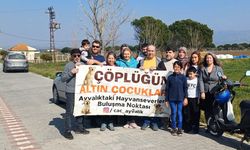 Ayvalık’ta hayvanseverler kuruyan ağaçların yerine yeni fidanlar dikti